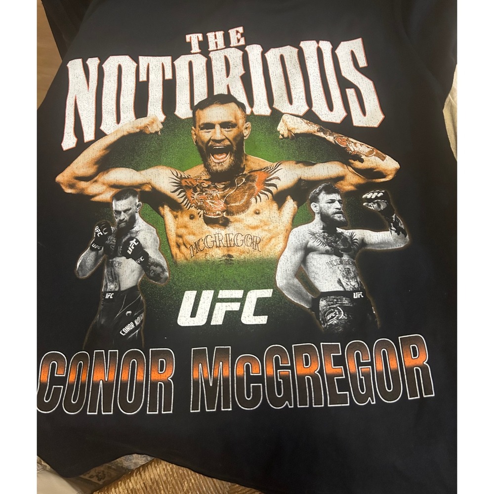 Black UFC t-shirt featuring Conor McGregor graphic, Size Medium, 50/50